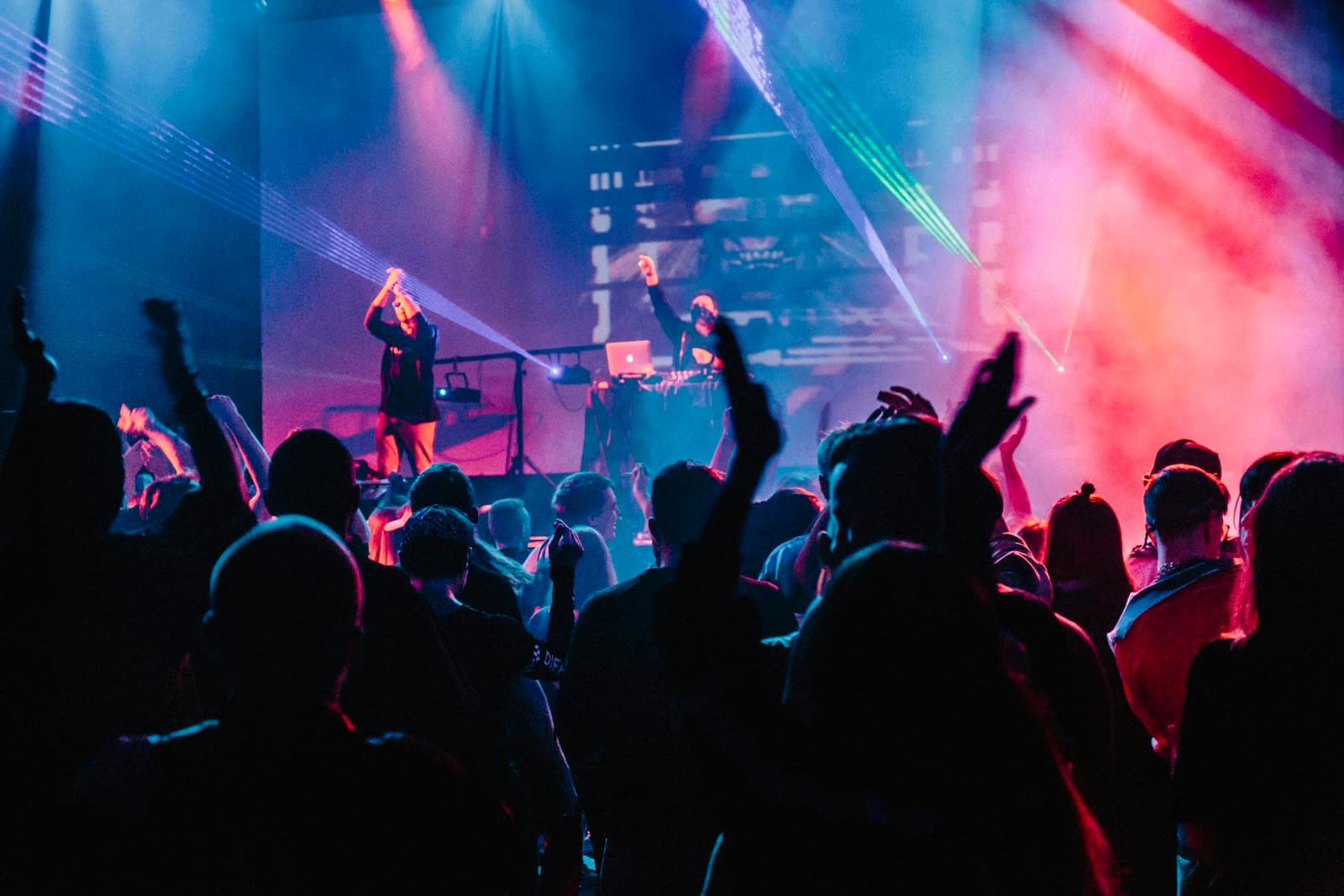Crowd at a club under purple lights